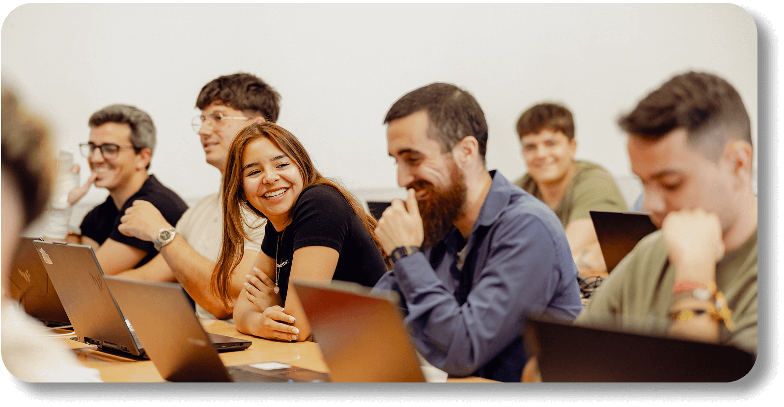 College students engaging with Kahoot! on laptops during a lecture